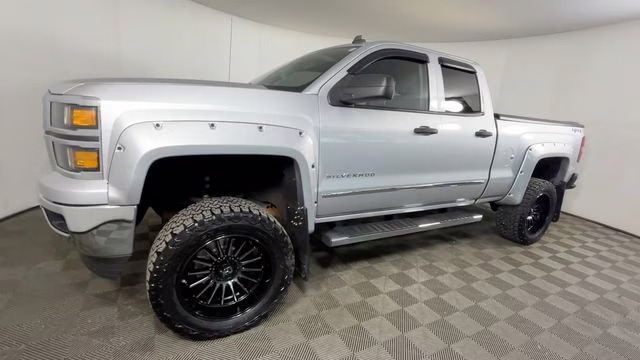 2014 Silver Ice Metallic Chevrolet Silverado 1500 LT 4X4 Truck