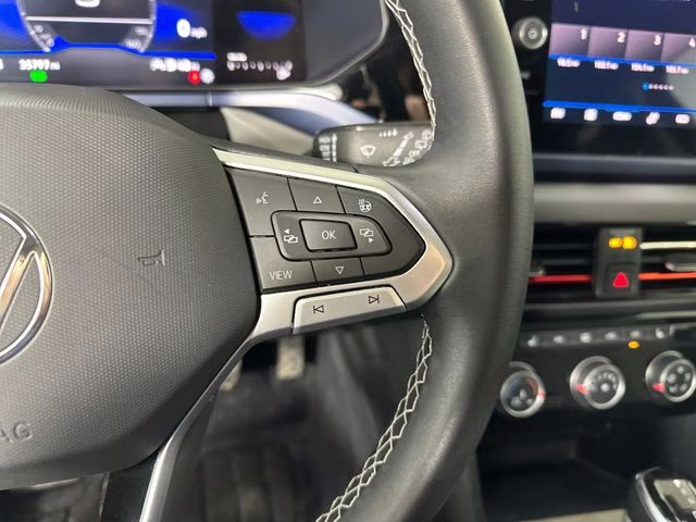 2023 Black Volkswagen Taos 1.5T SE AWD SUV