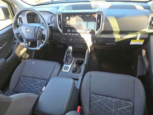 2026 Glacier White Nissan Frontier SV 4X4 Truck