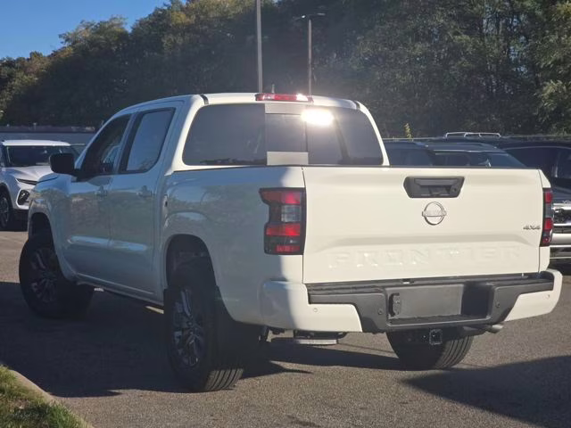 2026 Glacier White Nissan Frontier SV 4X4 Truck
