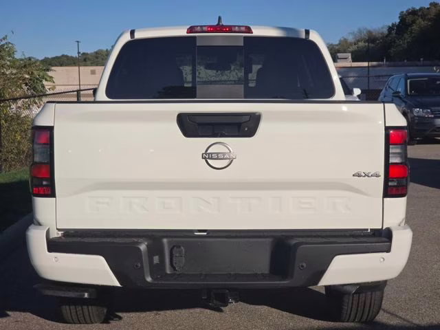 2026 Glacier White Nissan Frontier SV 4X4 Truck
