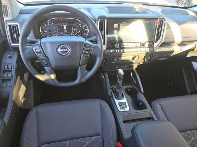 2026 Glacier White Nissan Frontier SV 4X4 Truck