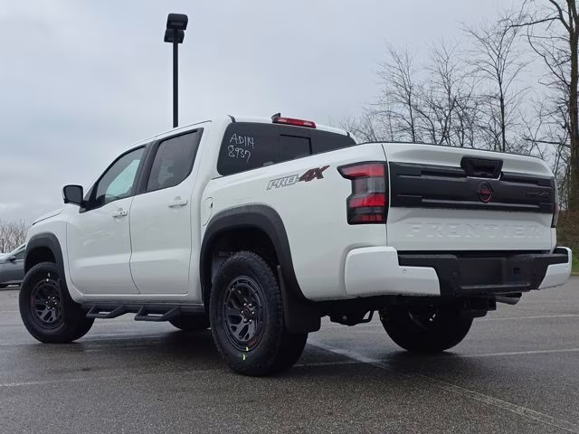 2026 Glacier White Nissan Frontier PRO-4X 4X4 Truck
