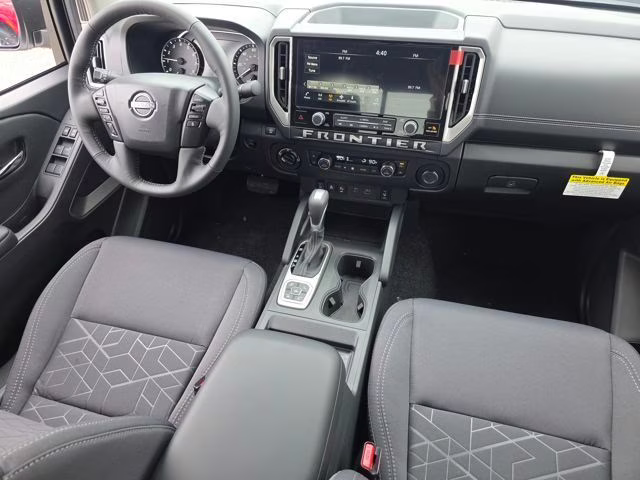2026 Glacier White Nissan Frontier SV 4X4 Truck