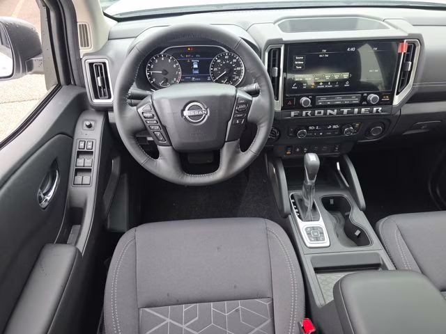 2026 Glacier White Nissan Frontier SV 4X4 Truck