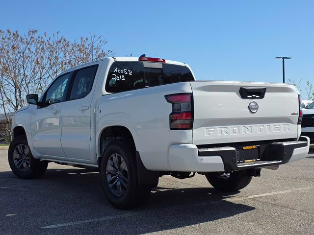 2026 Glacier White Nissan Frontier SV 4X4 Truck