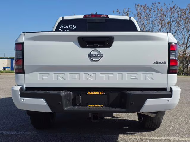 2026 Glacier White Nissan Frontier SV 4X4 Truck