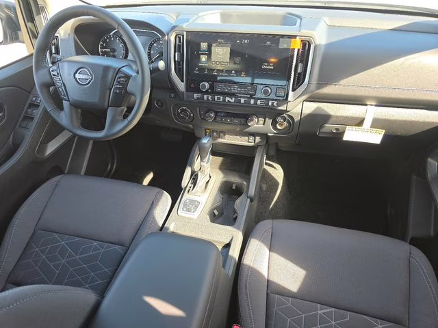 2026 Glacier White Nissan Frontier SV 4X4 Truck