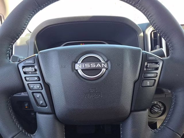 2026 Glacier White Nissan Frontier SV 4X4 Truck