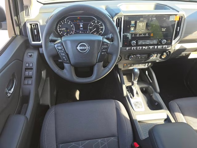 2026 Glacier White Nissan Frontier SV 4X4 Truck