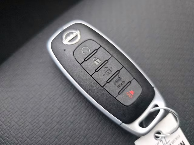 2026 Everest White Pearl Tricoat Nissan Rogue SV FWD SUV
