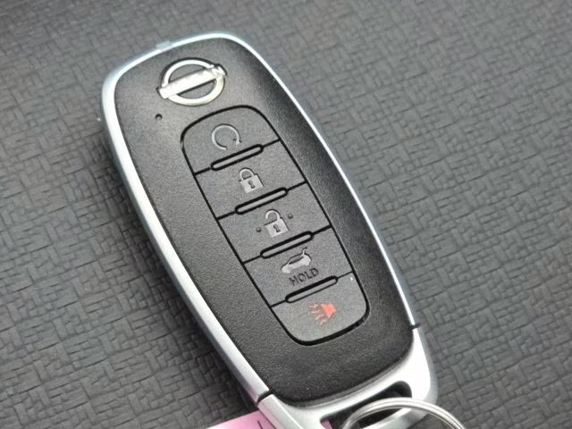 2026 Everest White Pearl Tricoat Nissan Rogue Dark Armor AWD SUV