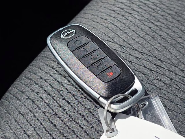 2026 Everest White Pearl Tricoat Nissan Rogue SV AWD SUV