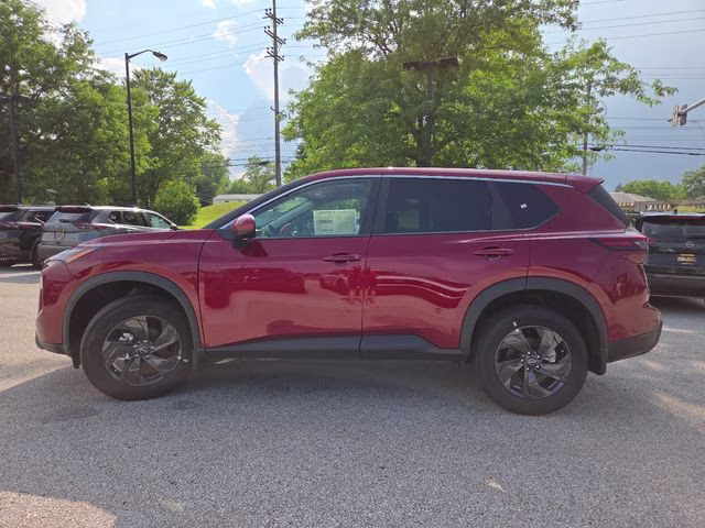2026 Scarlet Ember Tintcoat Nissan Rogue SV AWD SUV