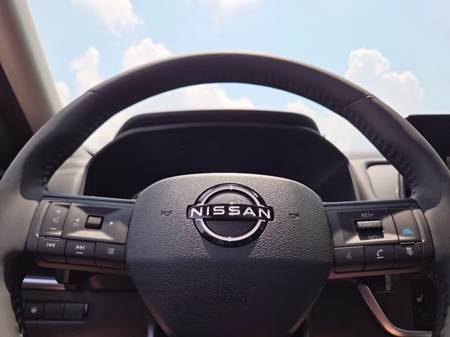 2026 Everest White Pearl Tricoat Nissan Rogue Dark Armor AWD SUV