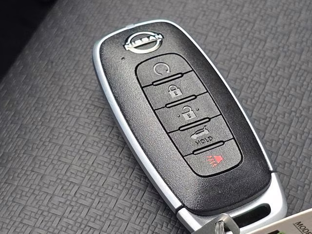 2026 Everest White Pearl Tricoat Nissan Rogue Dark Armor AWD SUV