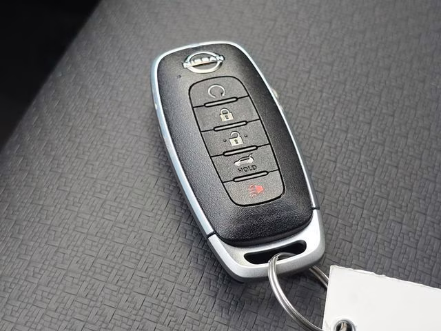 2026 Everest White Pearl Tricoat Nissan Rogue Dark Armor AWD SUV