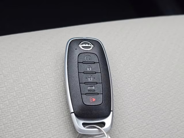 2026 Everest White Pearl Tricoat Nissan Rogue Dark Armor AWD SUV