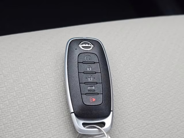 2026 Everest White Pearl Tricoat Nissan Rogue Dark Armor AWD SUV