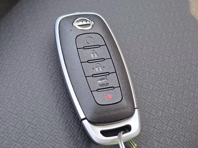 2026 Everest White Pearl Tricoat Nissan Rogue Dark Armor AWD SUV