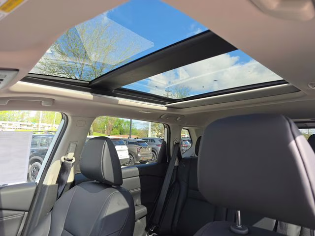 2026 Everest White Pearl Tricoat Nissan Rogue Dark Armor AWD SUV