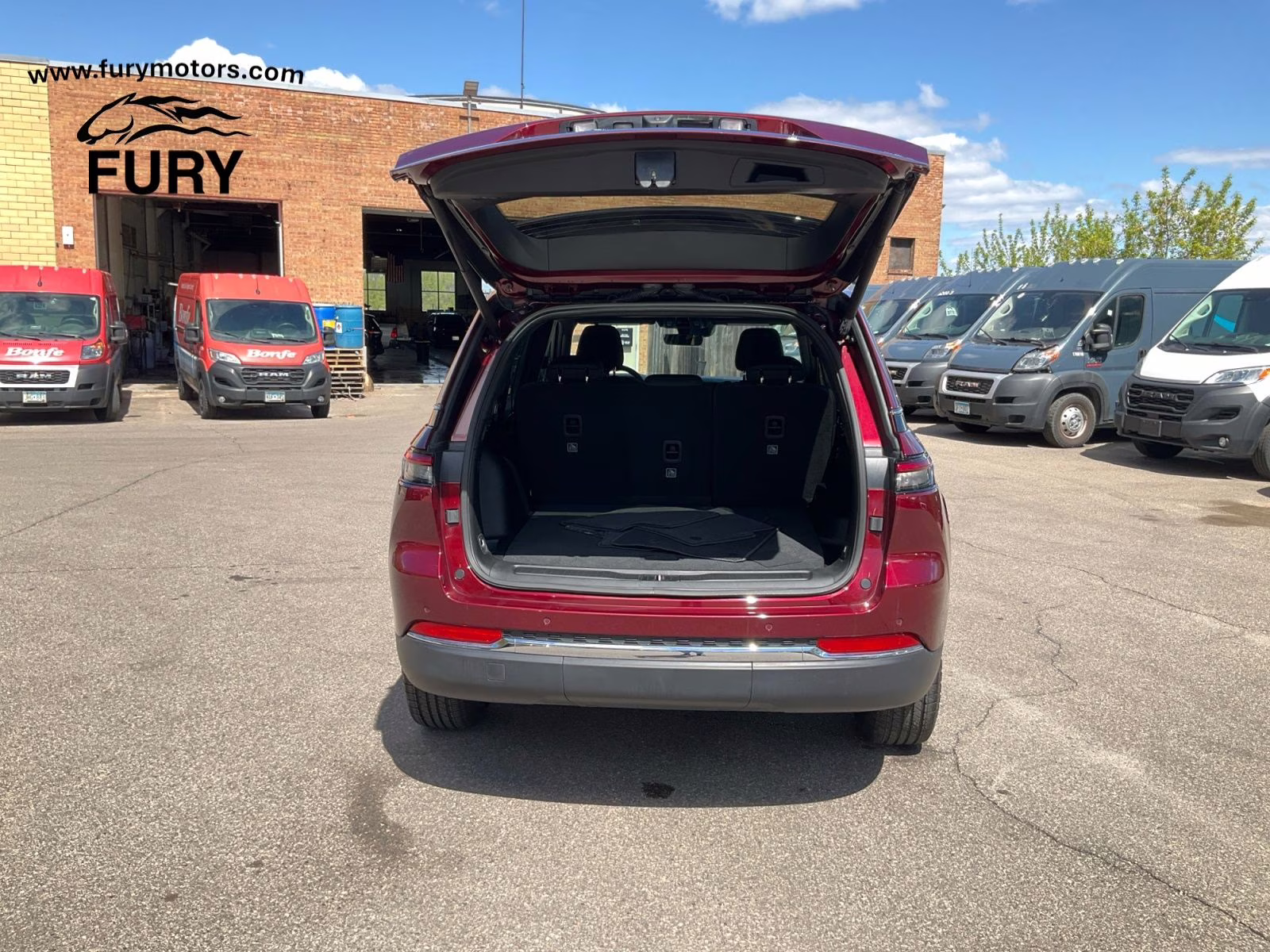 2025 Velvet Red Pearlcoat Jeep Grand Cherokee Laredo 4X4 SUV