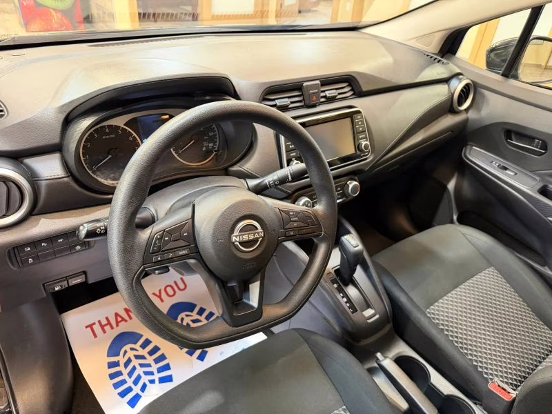 2024 Black Nissan Versa S Sedan 4D FWD