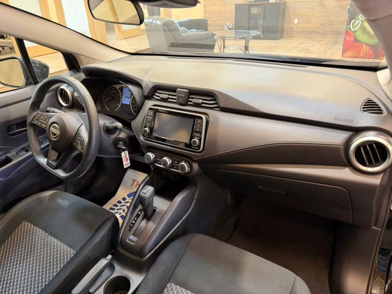 2024 Black Nissan Versa S Sedan 4D FWD