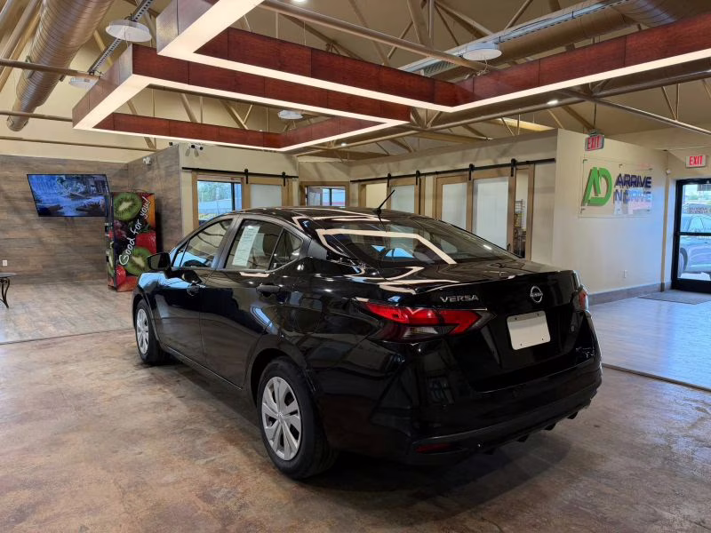 2024 Black Nissan Versa S Sedan 4D FWD