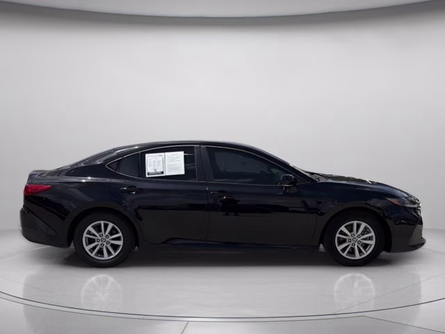 2025 Midnight Black Metallic Toyota Camry LE FWD Sedan