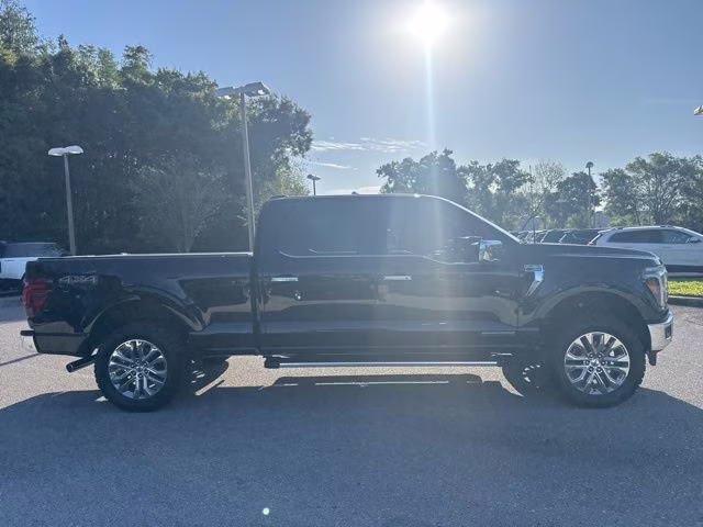 2025 Agate Black Metallic Ford F-150 LARIAT Crew Cab Pickup 4X4 Truck