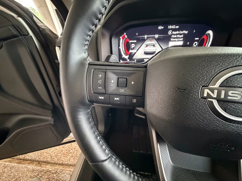 2025 Champagne Silver Metallic/Super Black Nissan Rogue SL FWD SUV