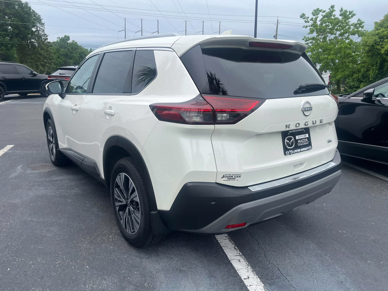 2023 Pearl White Tricoat Nissan Rogue SV FWD SUV