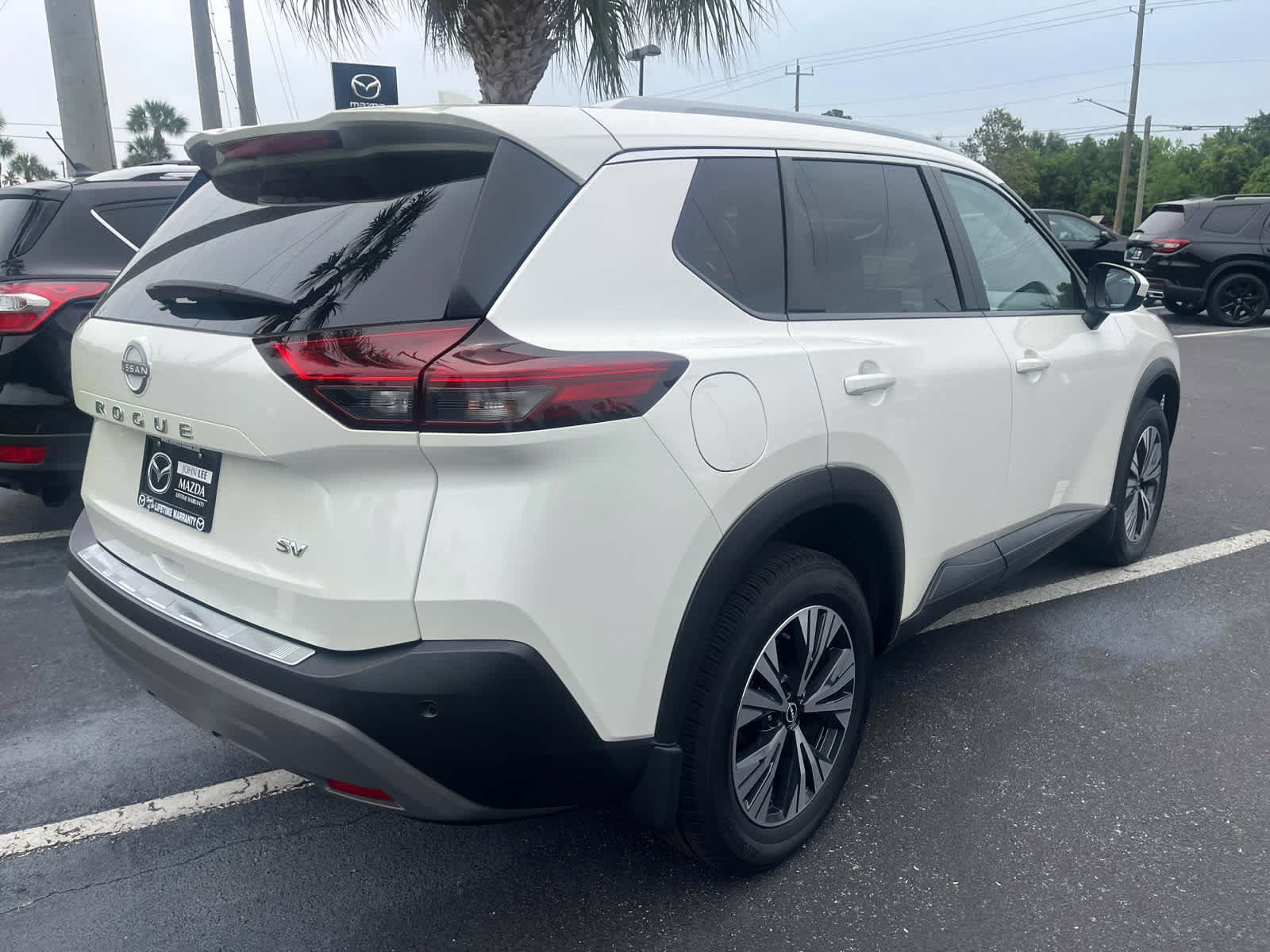 2023 Pearl White Tricoat Nissan Rogue SV FWD SUV