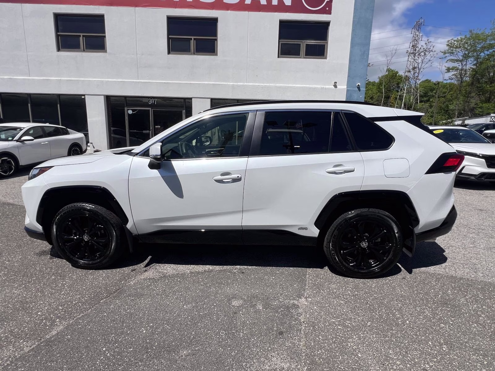 2024 Beige Toyota RAV4 Hybrid SE AWD (Natl) AWD SUV