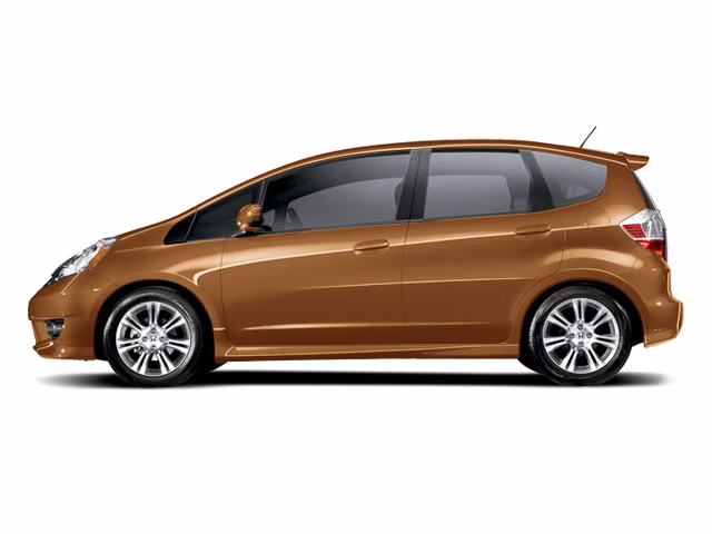 2010 Orange Honda Fit Sport FWD Hatchback