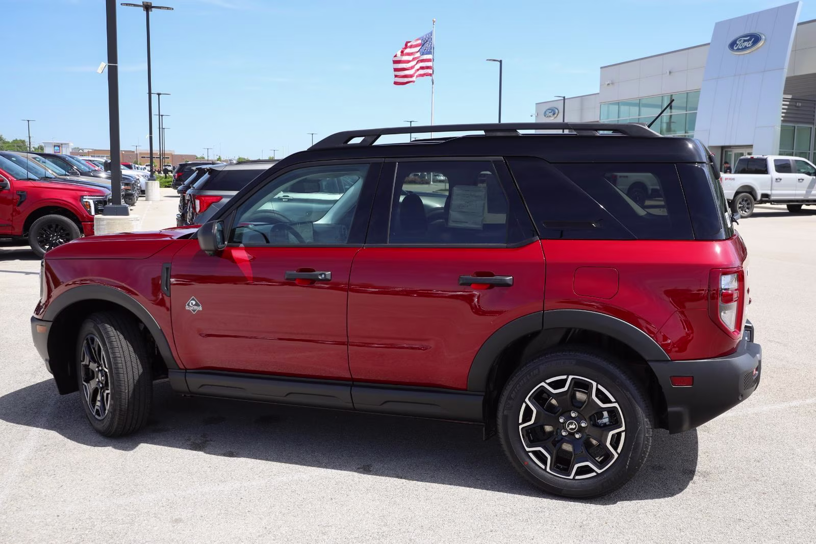 2026 Ruby Red Metallic Tinted Clearcoat Ford Bronco Sport Outer Banks 4X4 SUV