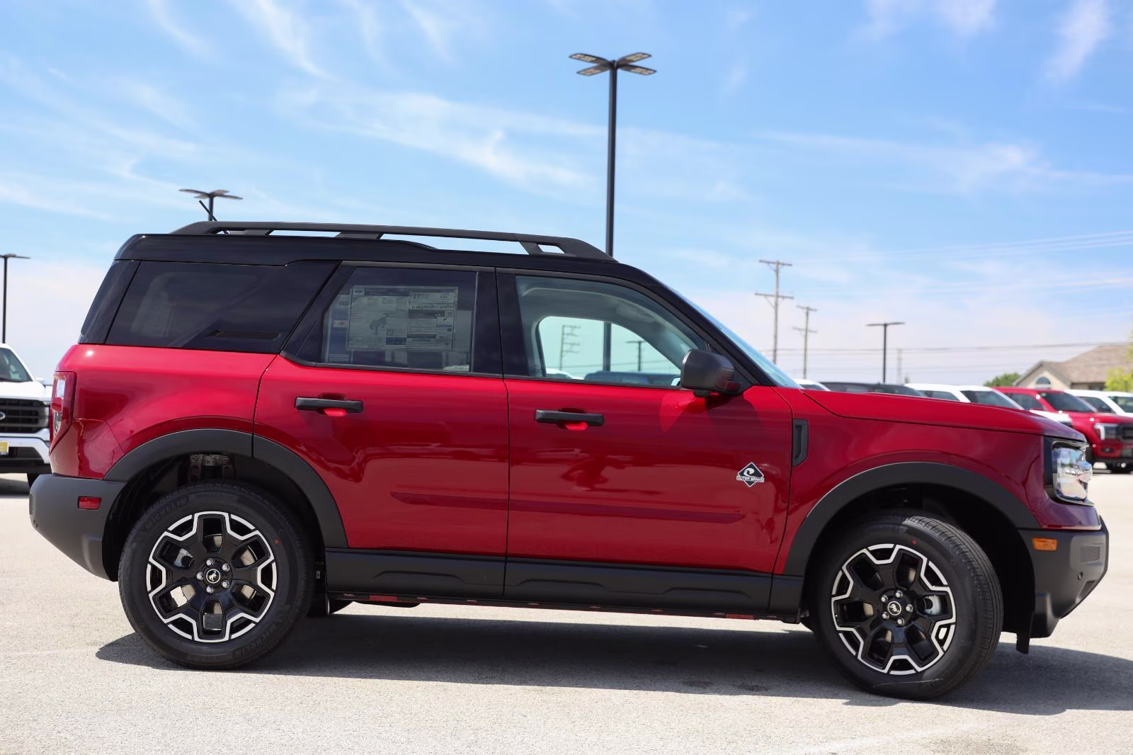 2026 Ruby Red Metallic Tinted Clearcoat Ford Bronco Sport Outer Banks 4X4 SUV