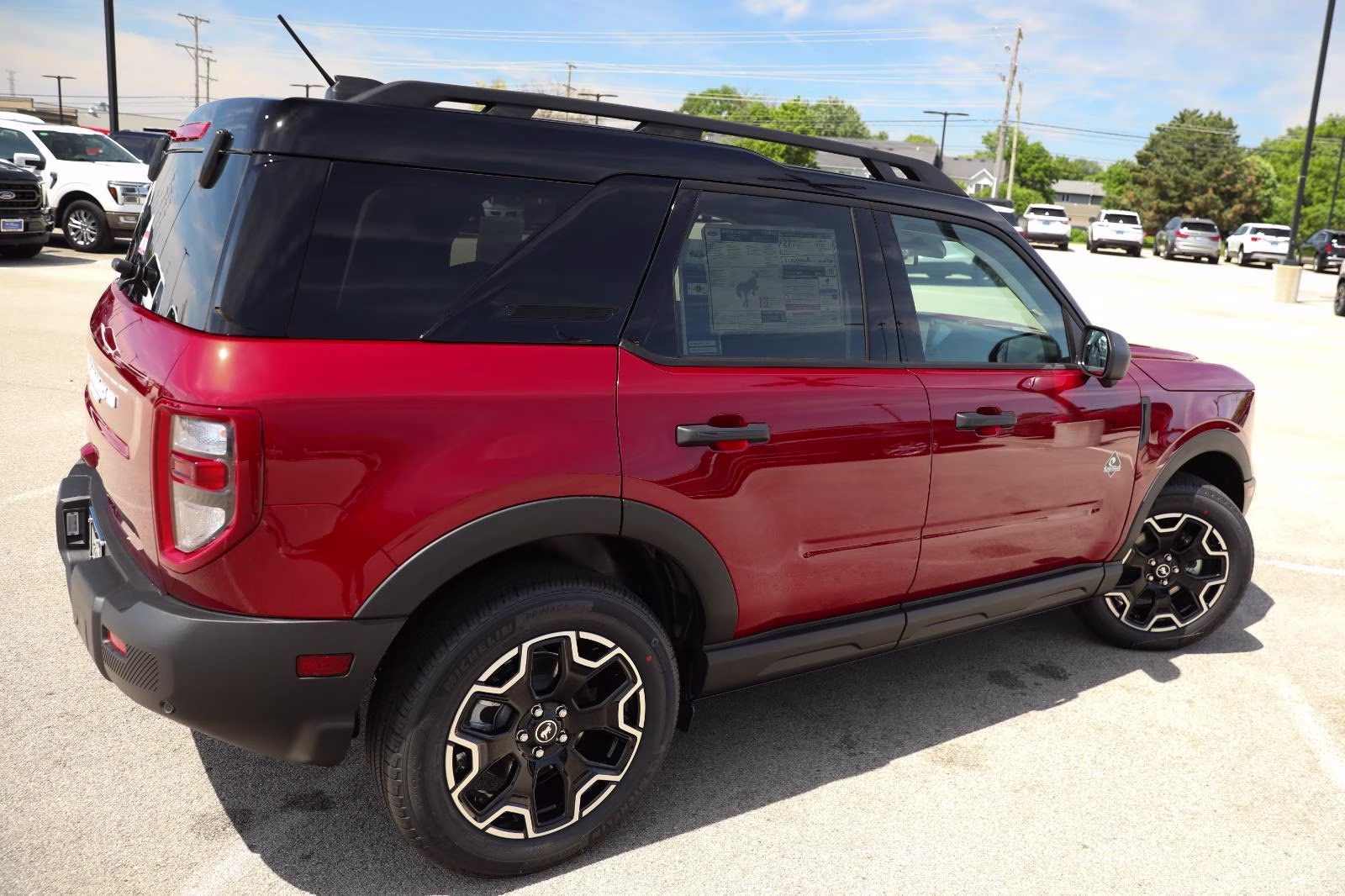 2026 Ruby Red Metallic Tinted Clearcoat Ford Bronco Sport Outer Banks 4X4 SUV