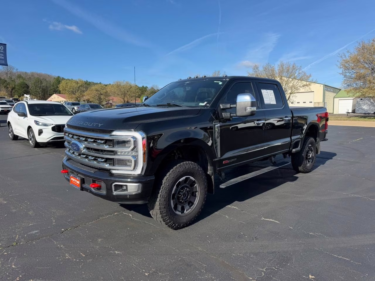 2024 Agate Black Metallic Ford Super Duty F-350 SRW Platinum 4X4 Truck