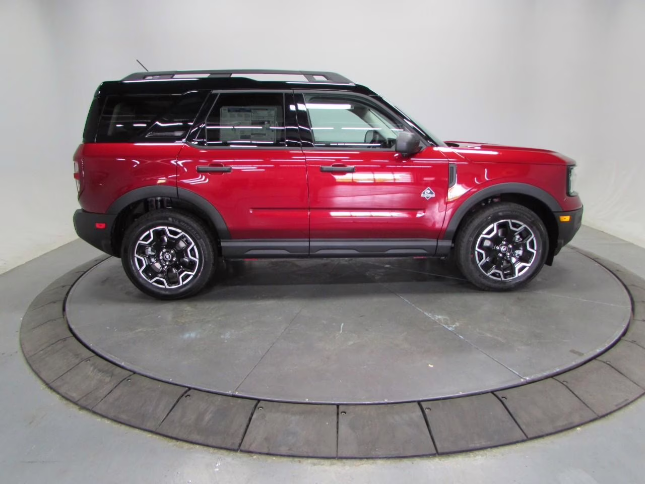 2026 Ruby Red Metallic Tinted Clearcoat Ford Bronco Sport Outer Banks 4X4 SUV