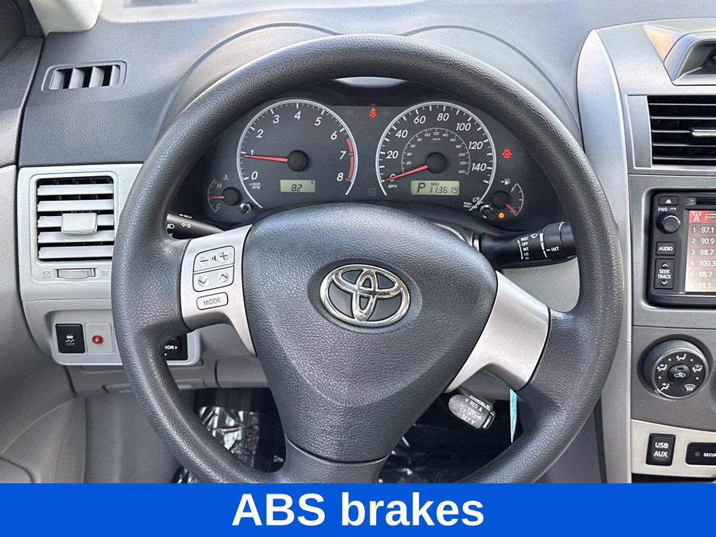 2013 Magnetic Gray Metallic Toyota Corolla LE FWD Sedan