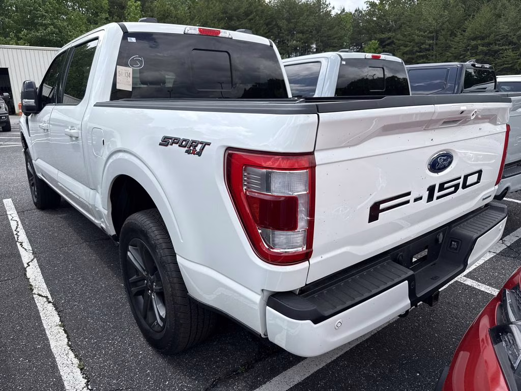 2023 Star White Metallic Tri-Coat Ford F-150 Lariat 4X4 Truck