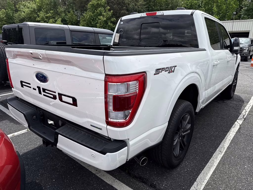 2023 Star White Metallic Tri-Coat Ford F-150 Lariat 4X4 Truck