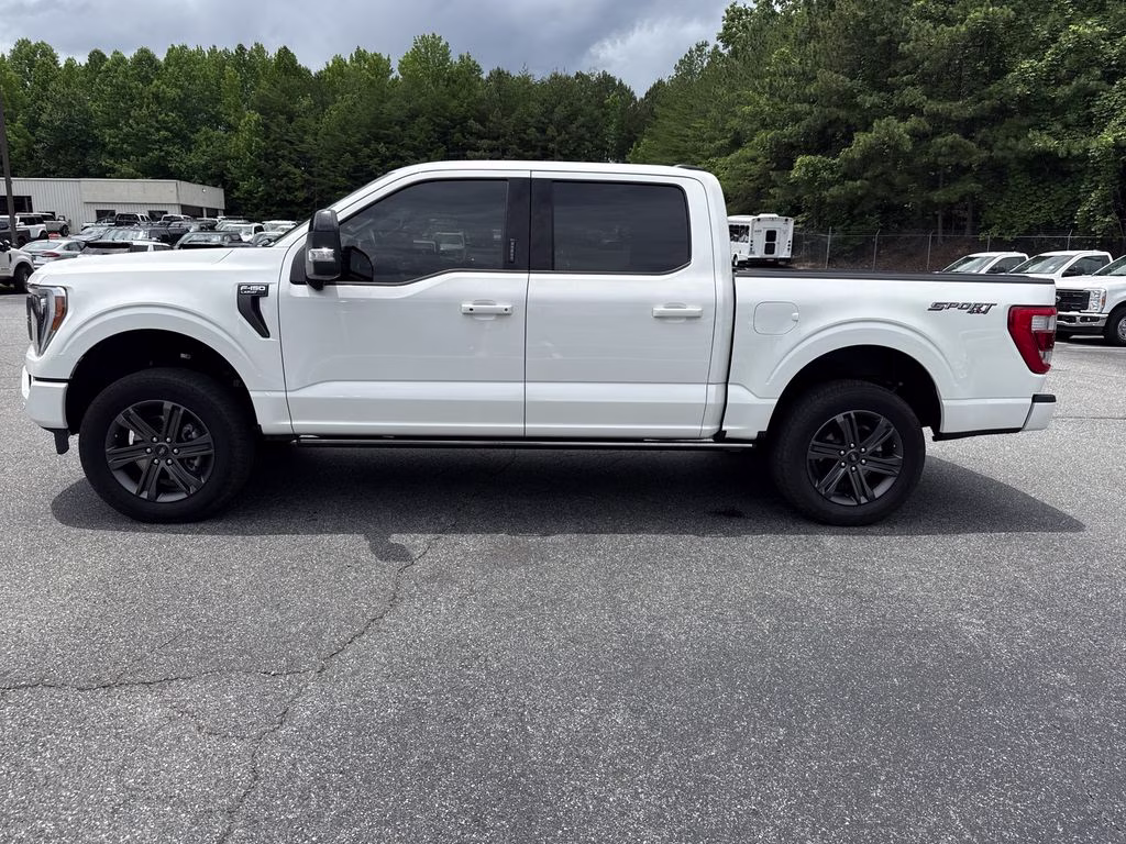 2023 Star White Metallic Tri-Coat Ford F-150 Lariat 4X4 Truck