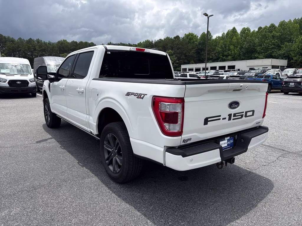 2023 Star White Metallic Tri-Coat Ford F-150 Lariat 4X4 Truck