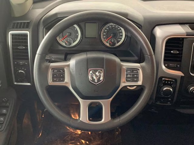2024 Diamond Black Crystal Pearlcoat Ram 1500 SLT 4X4 Truck