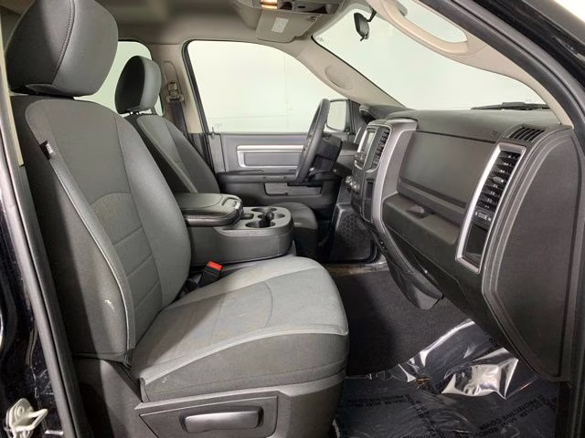 2024 Diamond Black Crystal Pearlcoat Ram 1500 Classic SLT 4X4 Truck