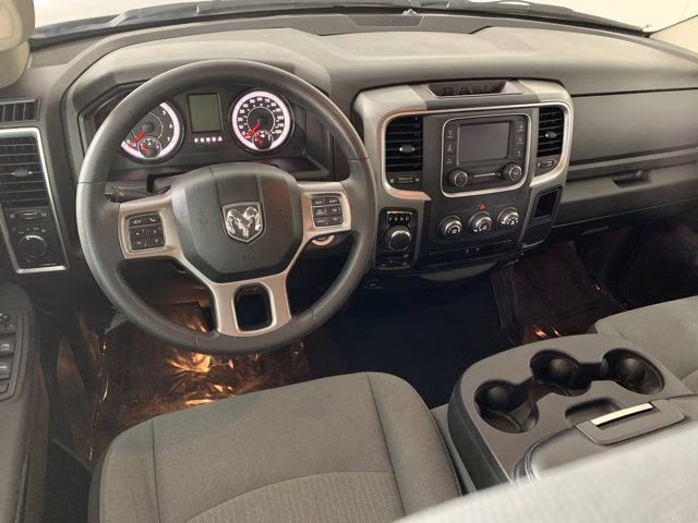 2024 Diamond Black Crystal Pearlcoat Ram 1500 Classic SLT 4X4 Truck