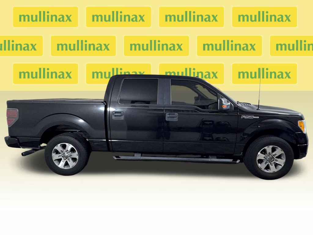 2011 Tuxedo Black Metallic Ford F-150 XLT RWD Truck